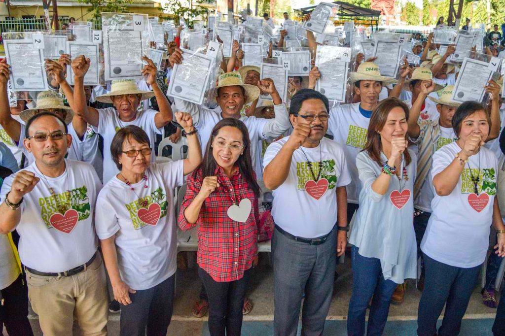 FINALLY, THEIR OWN LAND! Mayor Cristy Angeles  and Governor Susan Yap-Sulit join DAR Sec. Rafael “Ka Paeng” Mariano for the Certificates of Land Ownership Award (CLOA) Distribution to 111 farmers of Hacienda Luisita at Brgy. Balete./Tarlac CIO